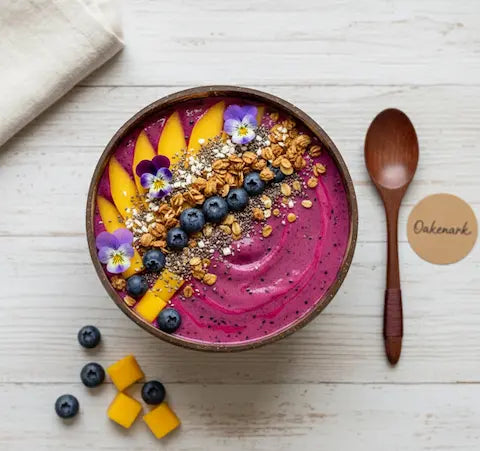 Colorful aesthetic breakfast served in a coconut bowl with fruit and toppings