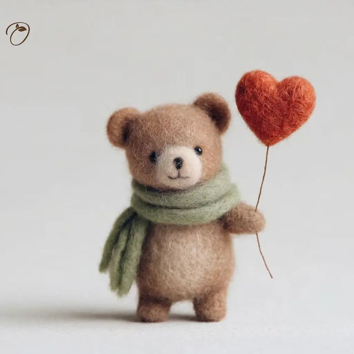 Teddy bear holding a heart-shaped balloon on a light background