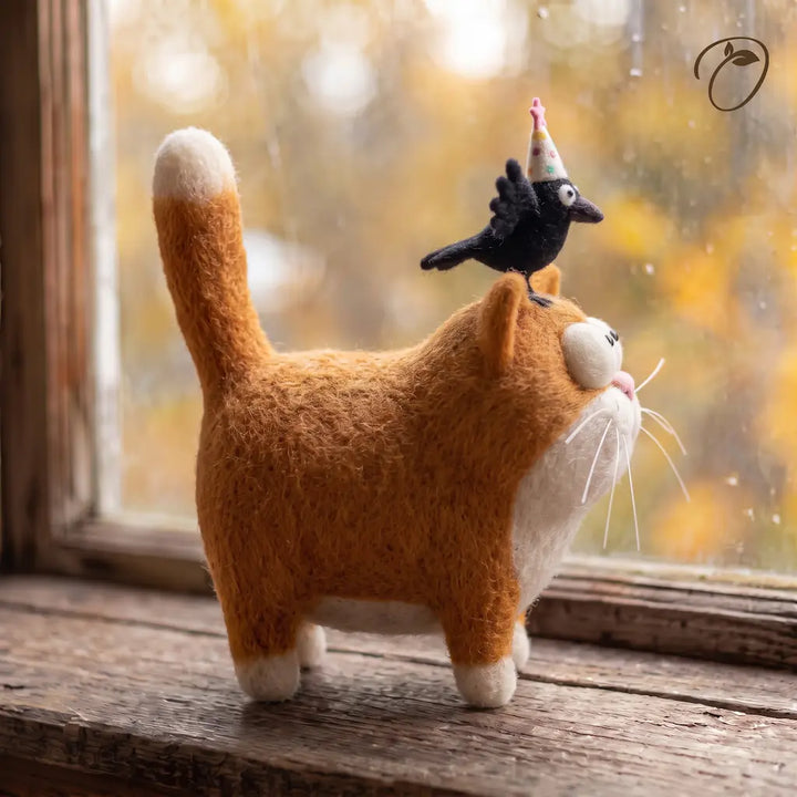 Side view of Party Crow and Cat felt figurine showing the cat&