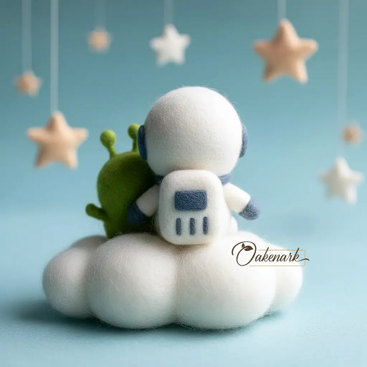 Toy astronaut and alien on a cloud with hanging stars against a light blue background
