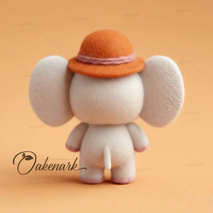 Toy elephant with an orange hat on a beige background, featuring the brand &