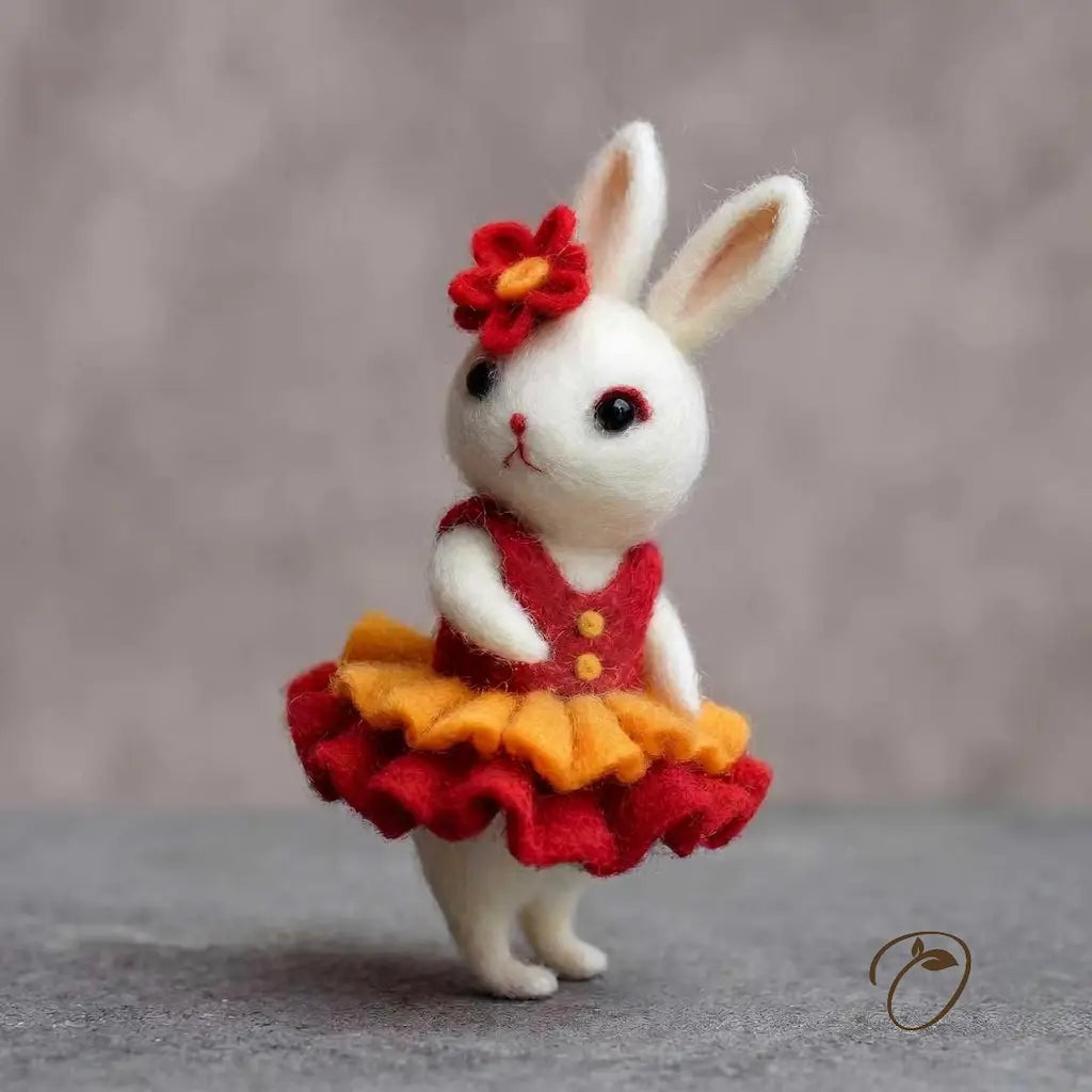 White rabbit toy wearing a red and orange dress with a flower headband on a gray background