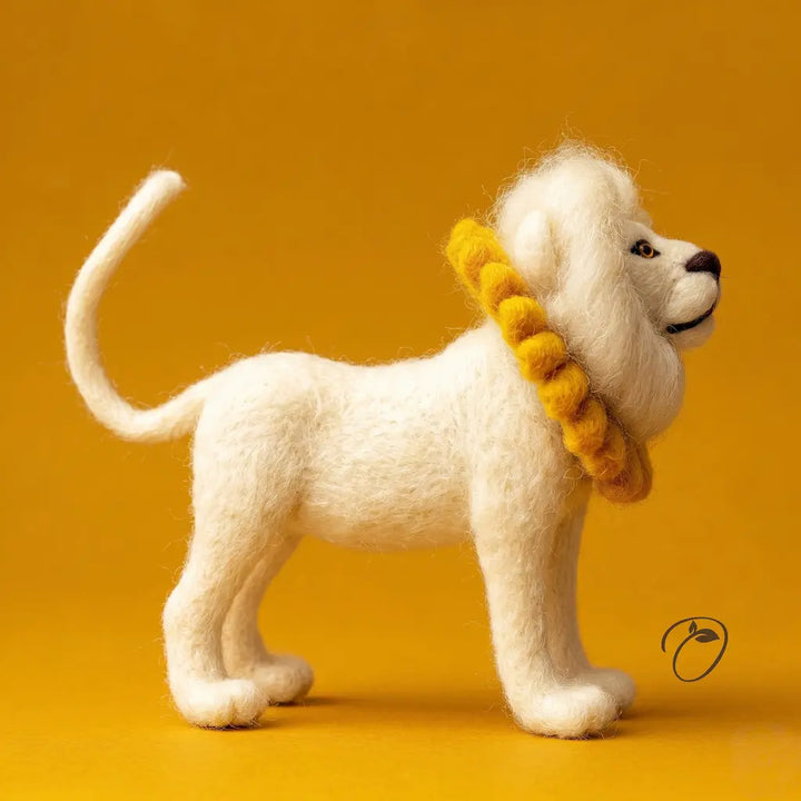 White lion figurine with a yellow mane on an orange background