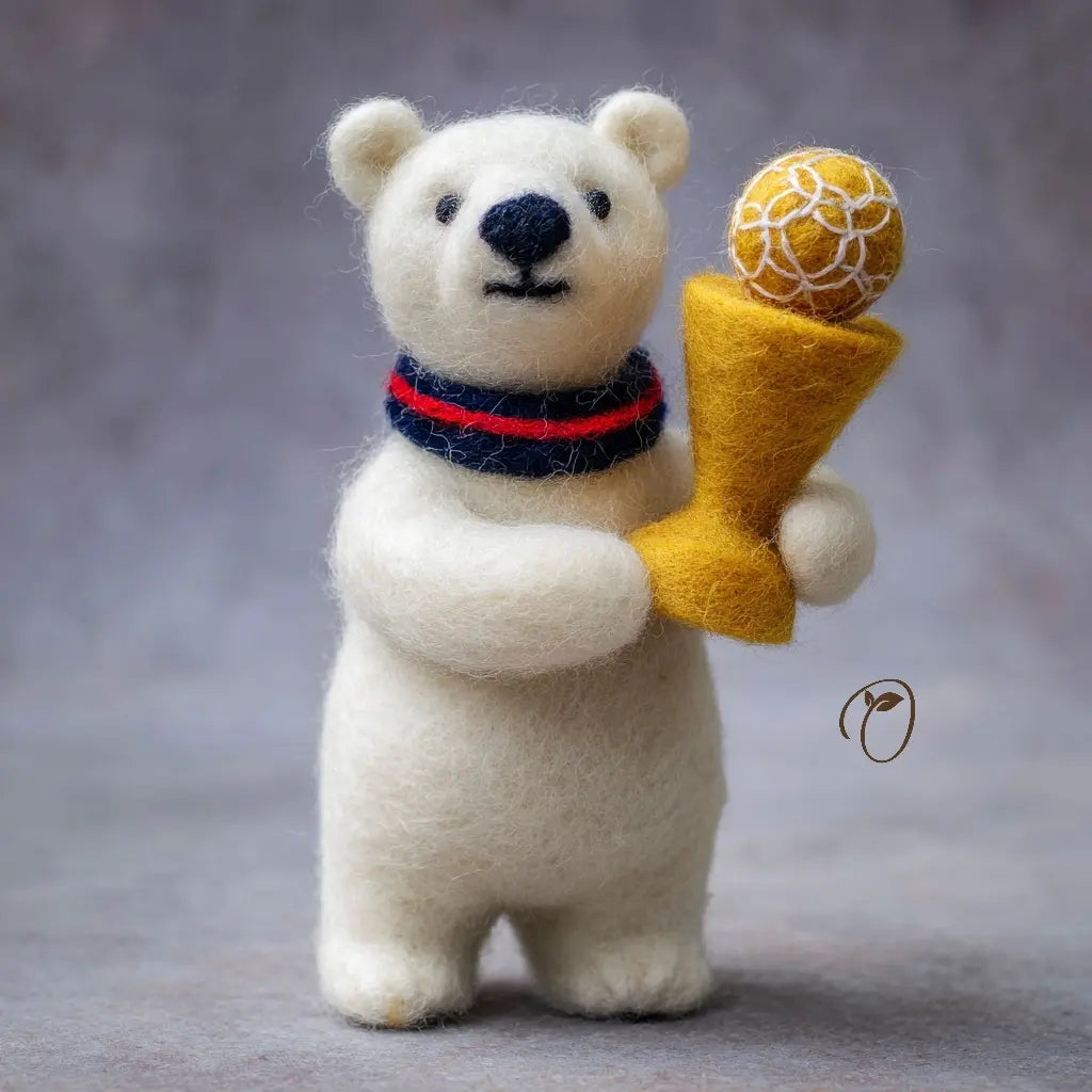 White polar bear figurine holding a yellow cone with a ball on a gray background