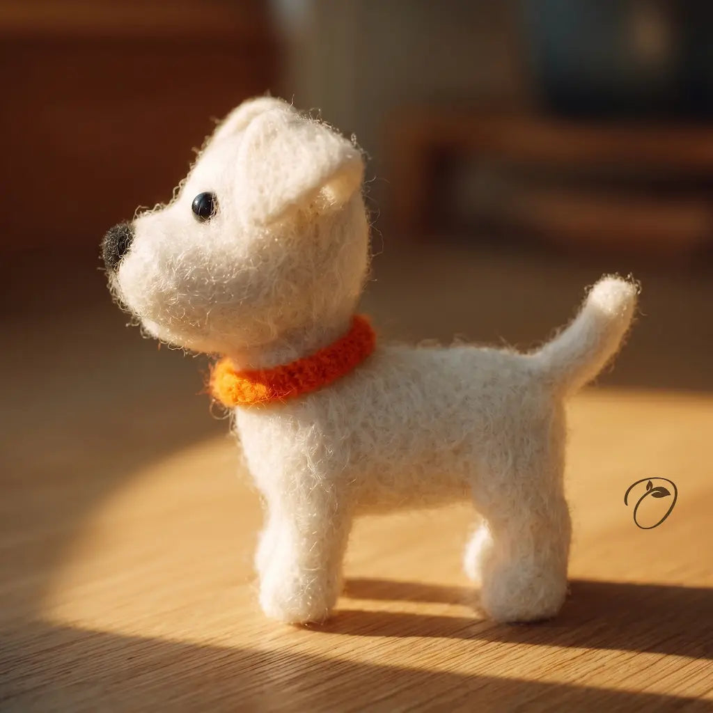 Small white dog figurine with an orange collar on a wooden surface