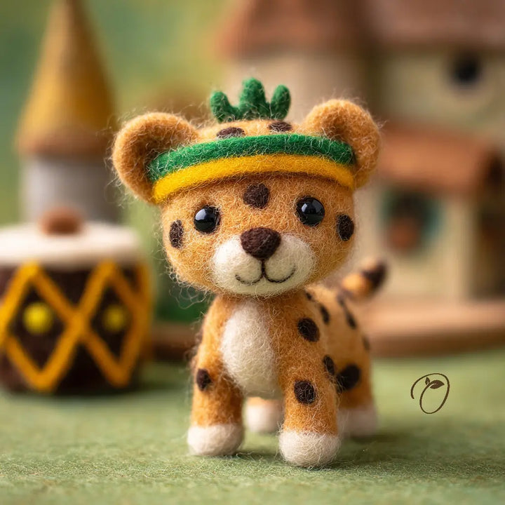 Toy leopard with a crown in front of a blurred background