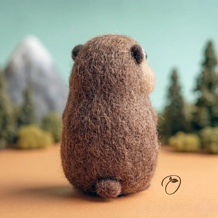 Plush toy groundhog with a natural background