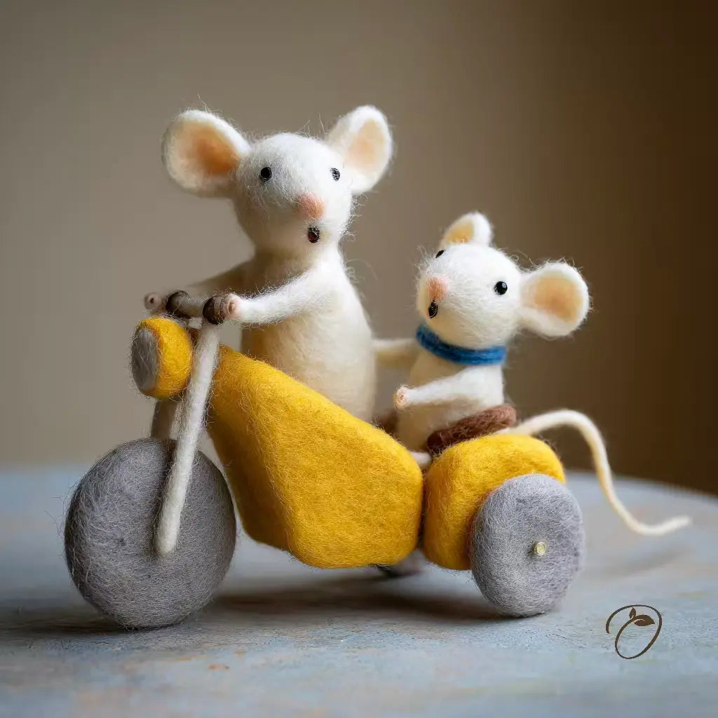 Two toy mice on a yellow motorcycle with a plain background