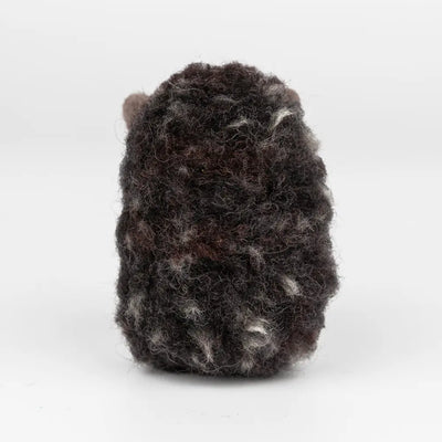 Textured black and gray object on a white background