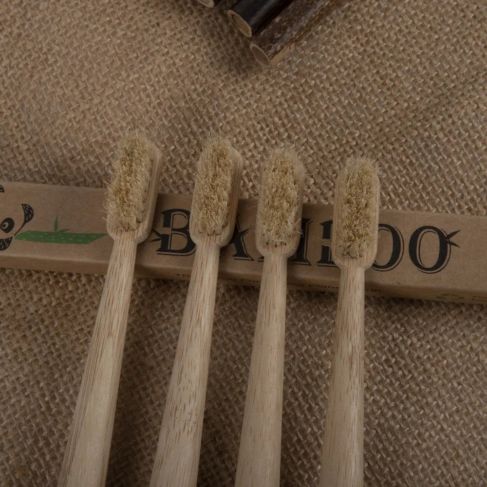 Four bamboo toothbrushes