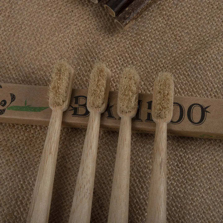 Four bamboo toothbrushes