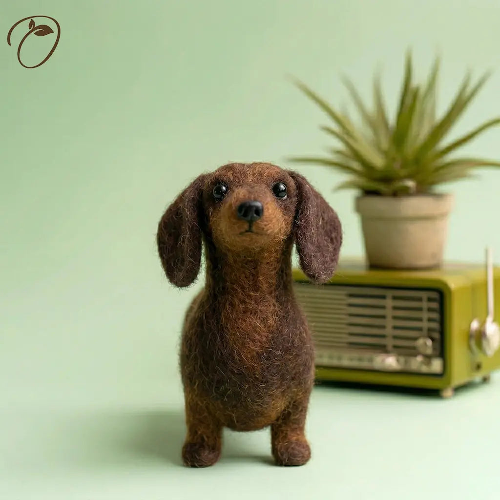 Brown dog figurine in front of a vintage radio and plant on a light green background