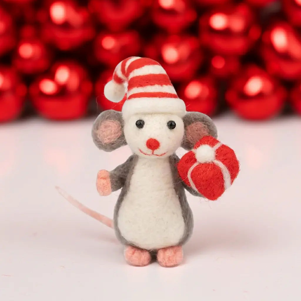 Felted mouse toy wearing a Santa hat and holding a red heart against a red heart-shaped background