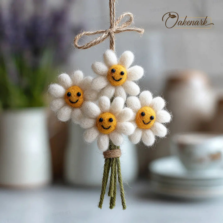Decorative hanging flowers with smiley faces on a blurred background