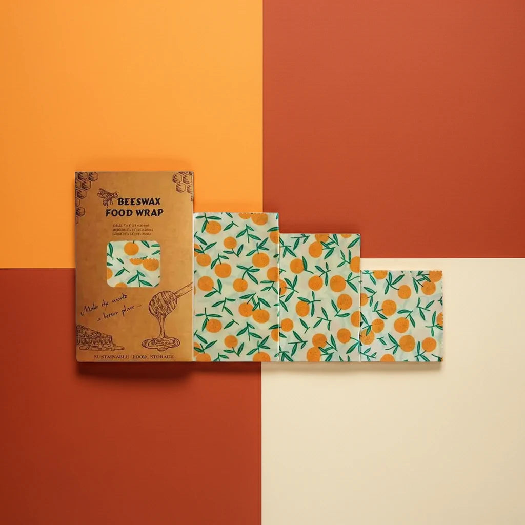 Beeswax food wrap with orange pattern and packaging