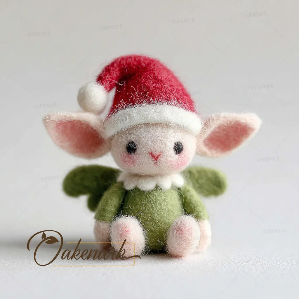 Small plush toy with a red Santa hat and green outfit on a light gray background