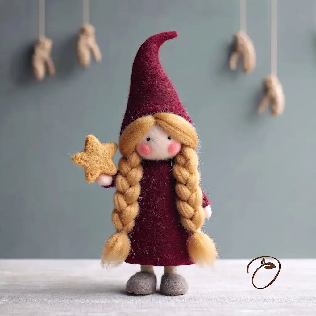 Blonde Nordic Mrs. Claus felt figurine with long braids, a burgundy pointed hat, and a golden felt star.
