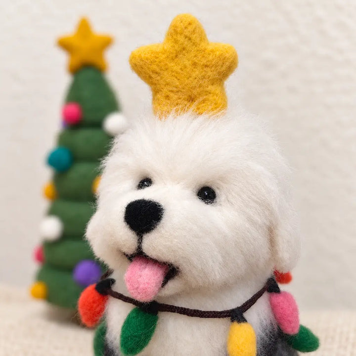 Close-up of an Old English Sheepdog felt figurine with fluffy white fur, a pink tongue, a golden star and colorful felt bulbs.