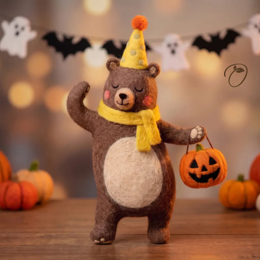 Pumpkin Party Bear wool felt figurine holding a jack-o’-lantern bucket