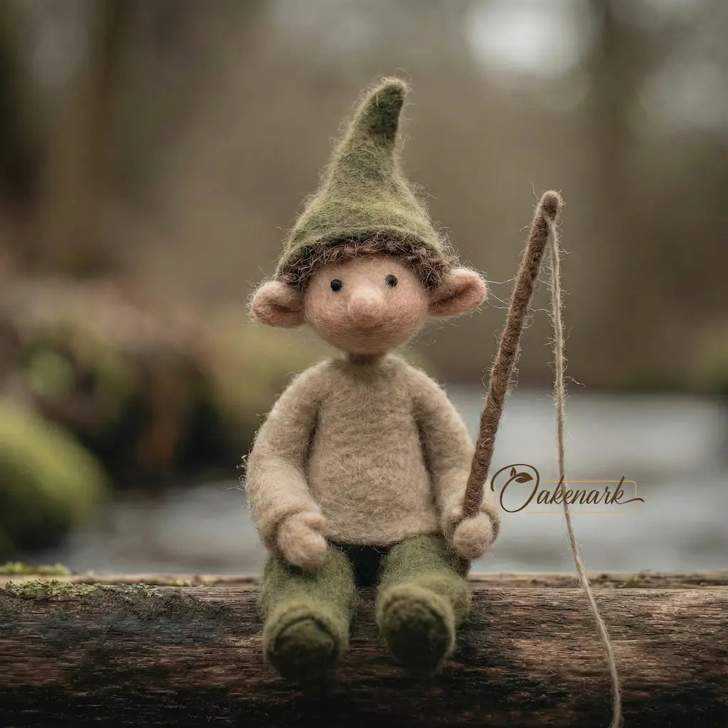 Felted gnome sitting on a log with a blurred natural background