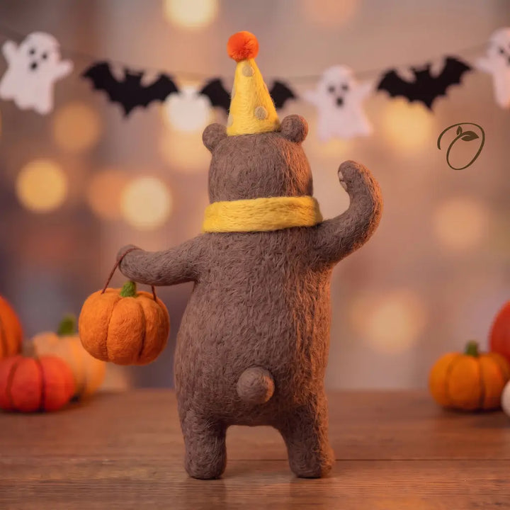 Back view of brown Pumpkin Party Bear felt figurine with yellow scarf and small tail