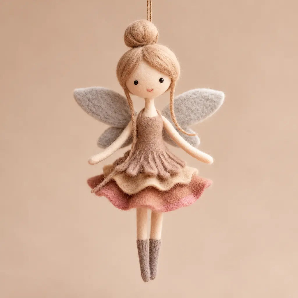 Blush Rose wool felt fairy ornament with a high bun, pale gray wings, and a layered taupe, cream, and dusty rose skirt.