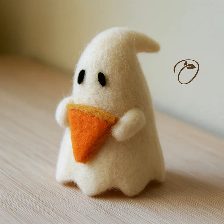 Angled view of a felt ghost holding pumpkin pie, showing its drooping head tip, rounded arms, and the thickness of the pie slice.