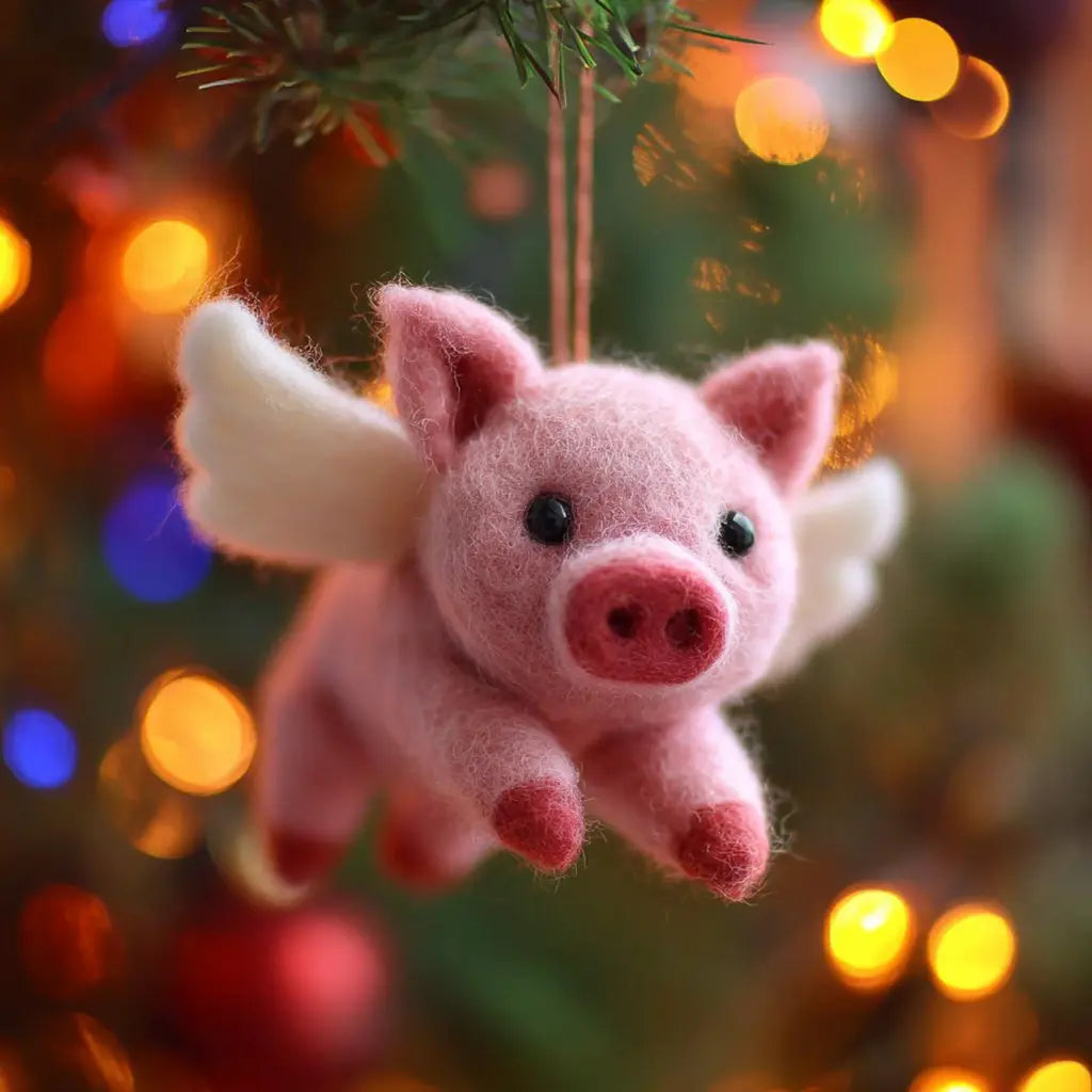 Pink pig with white wings hanging on a Christmas tree with colorful lights in the background