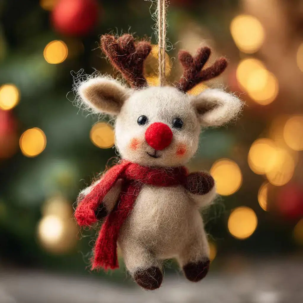 Felt reindeer ornament with a red scarf against a festive background