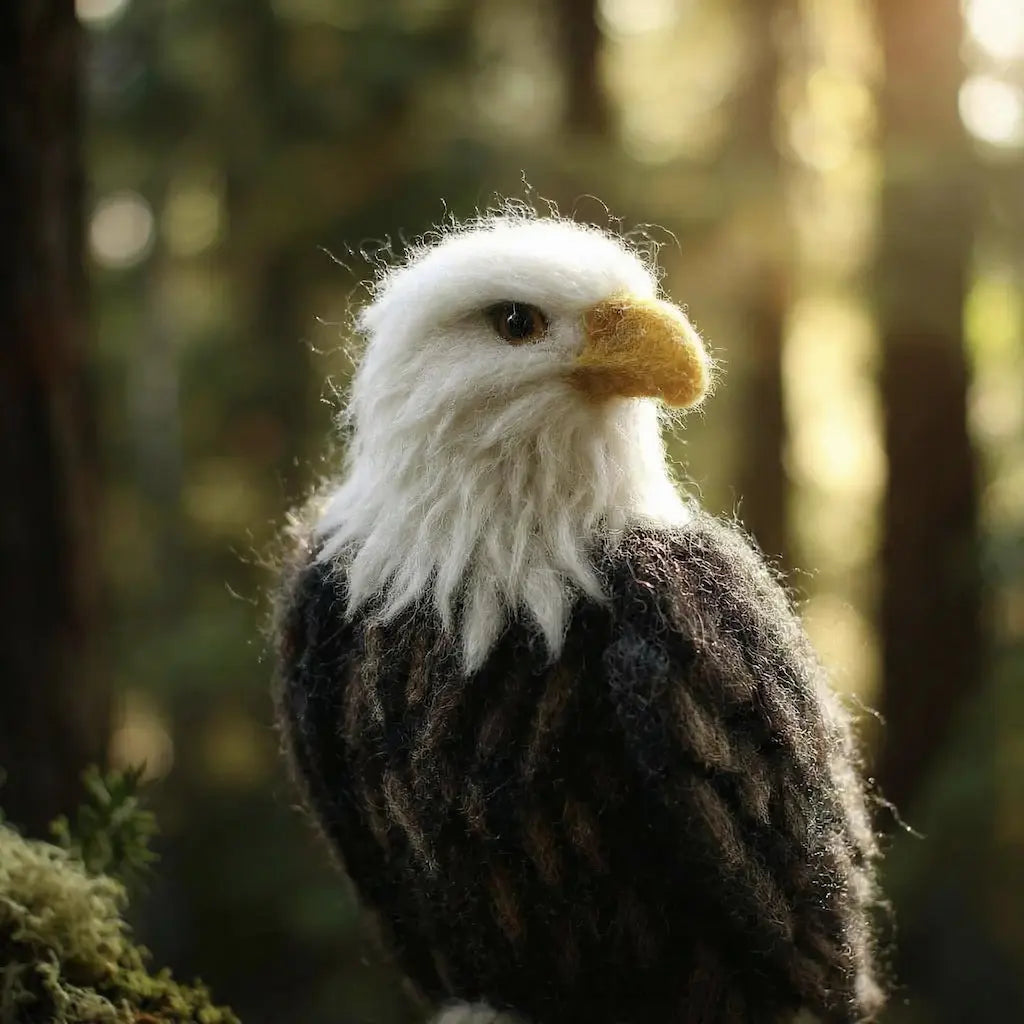 Felted Bald eagle in a forest setting