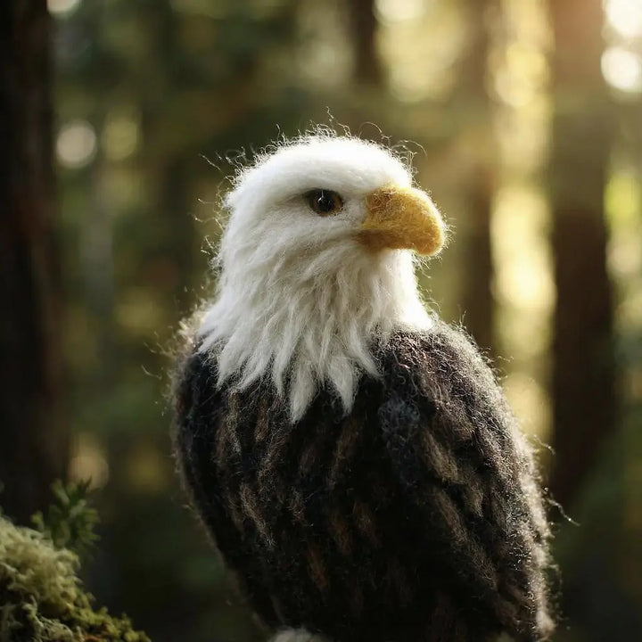 Felted Bald eagle in a forest setting