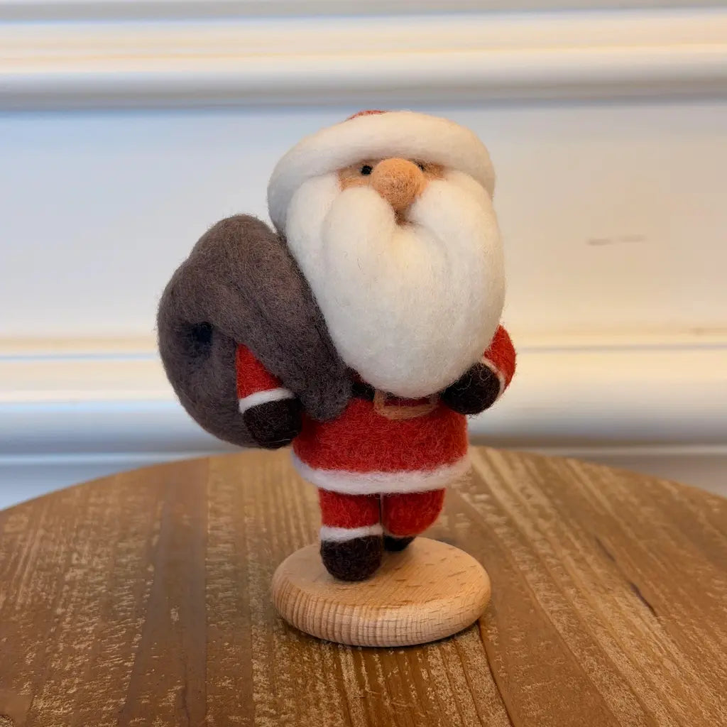 Walking Santa needle-felted Christmas collectible with toy sack