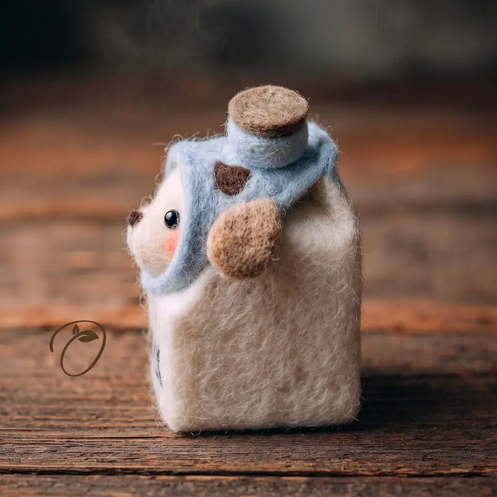 Front view of Milk Carton Puppy felt figurine with pale blue top and MILK lettering
