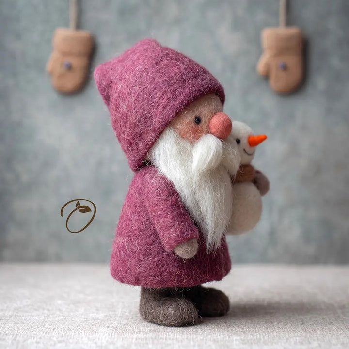 Side view of berry-red Santa and snowman needle-felted figurine