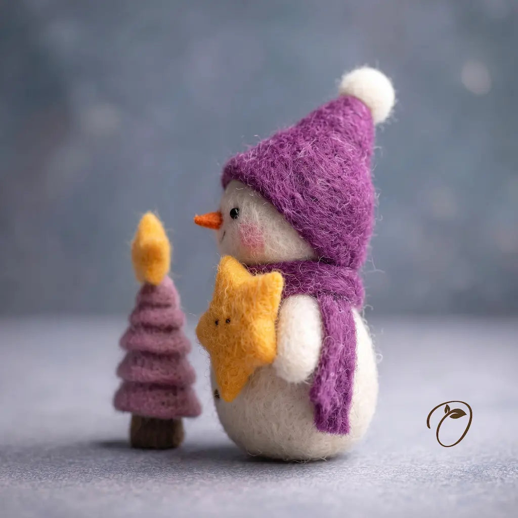 Side view of Starlight Snowman felt figurine showing its carrot nose, yellow star and purple scarf beside a miniature tree